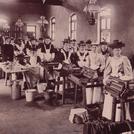 Women making butter at a dairy institute